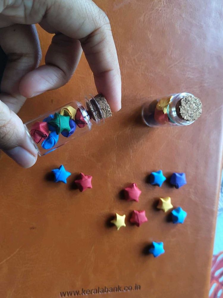 Glass Jars Filled With Paper Stars