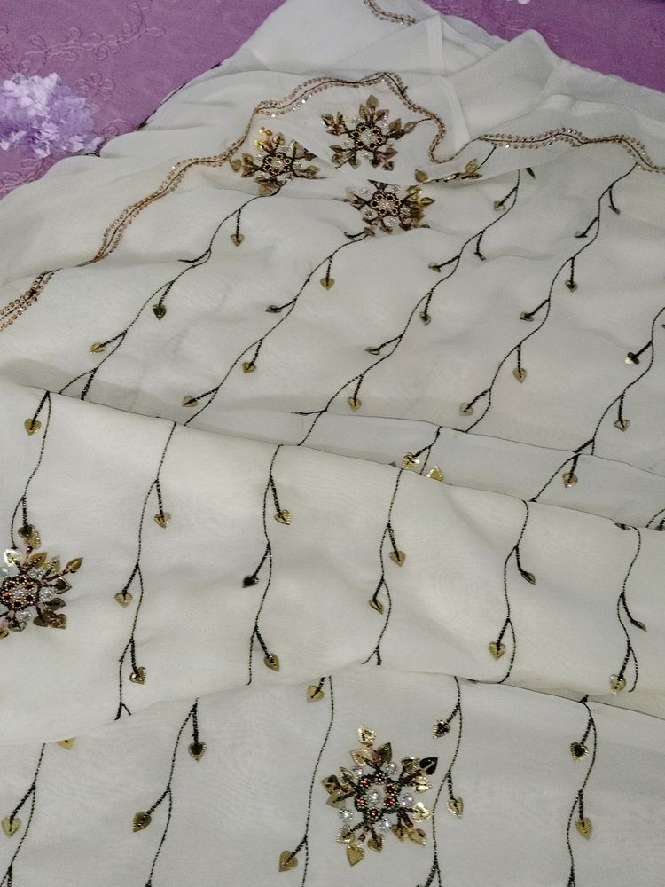 Cream Embroidered Saree
