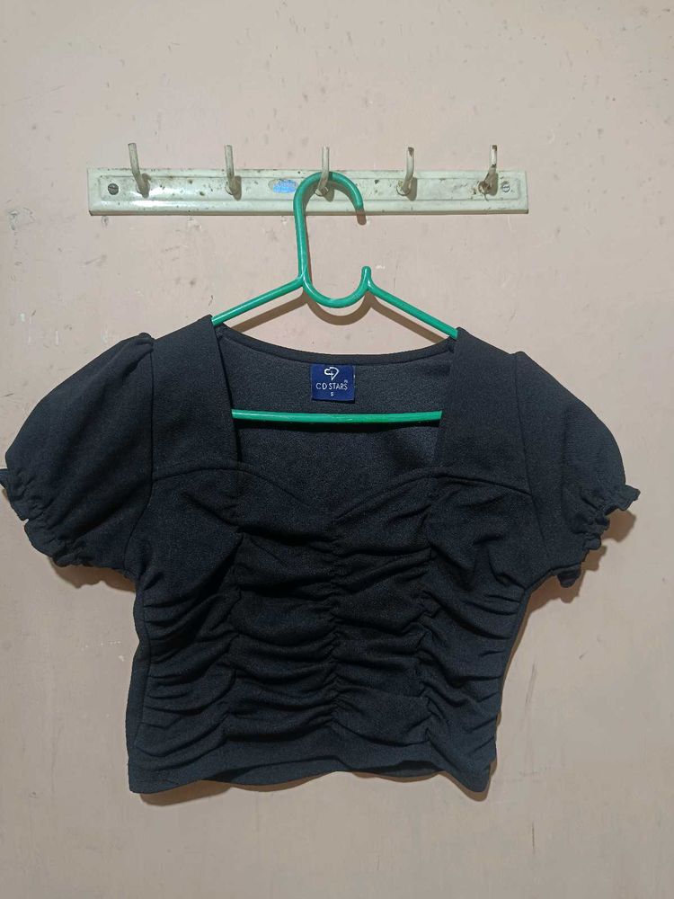 A Ruffled Black Crop Top