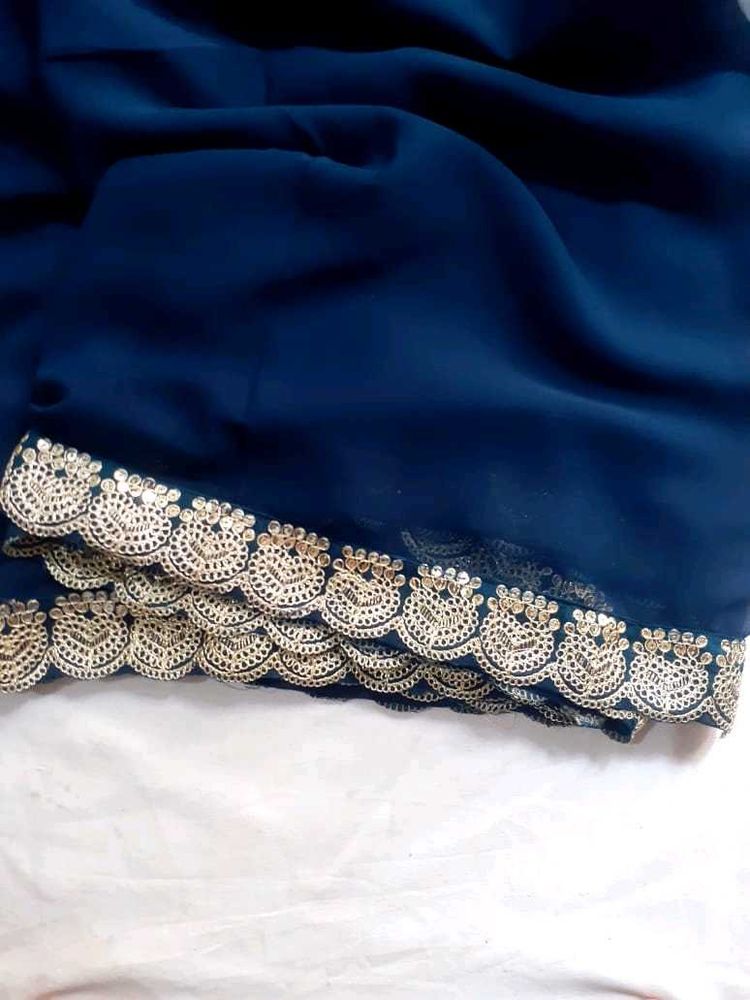 Elegant Navy Blue Saree With Golden Blouse Fabric