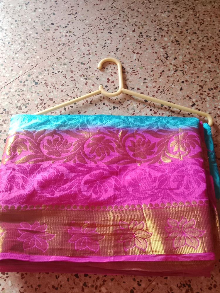 Blue And Pink Saree With Gold Border