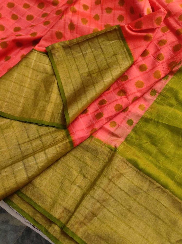 orange and green pocham.palli silk saree