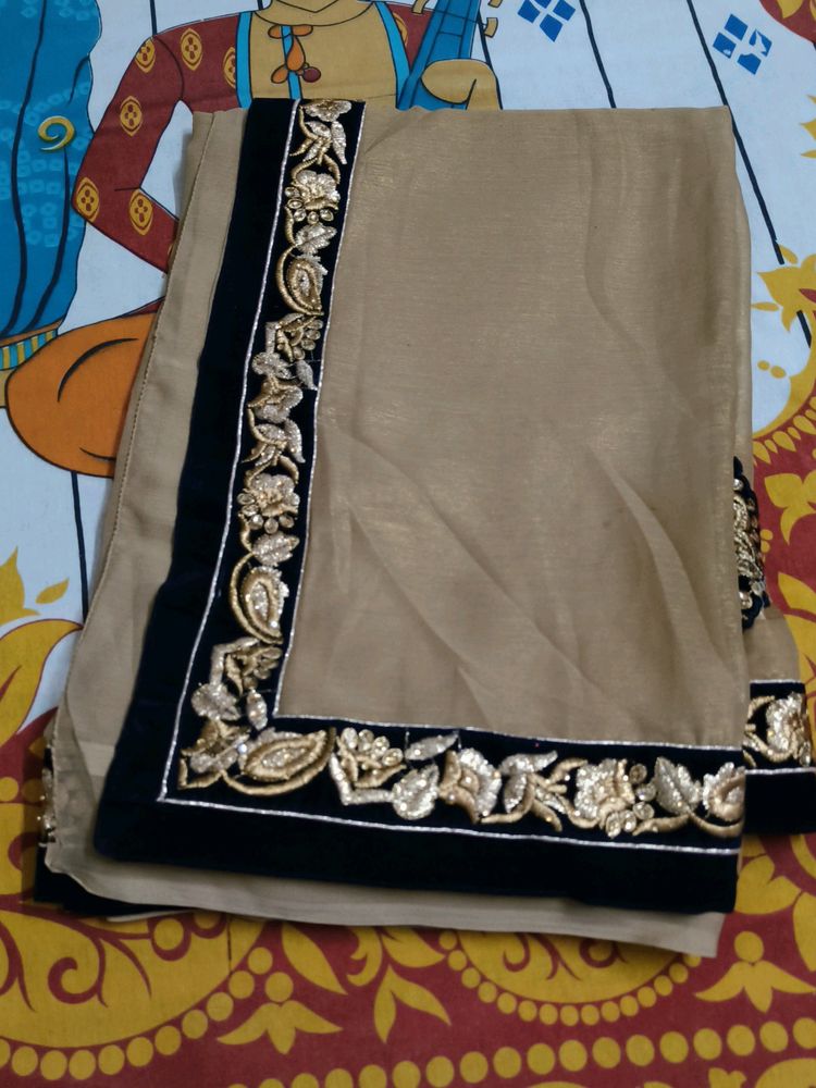 Golden Colour Saree With Blue Colour Velvet Border
