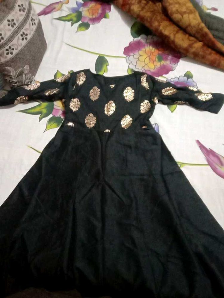 Black Dress with Gold Polka Dot Detail