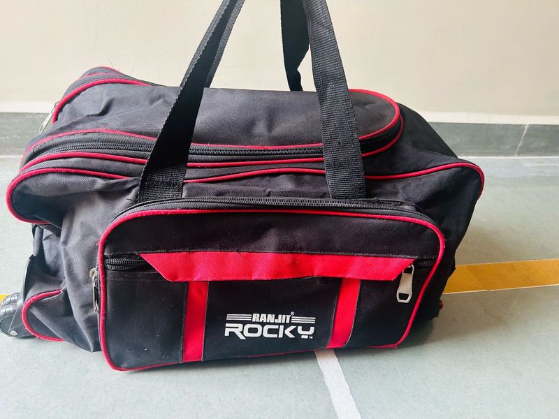 Ranjit Rocky Black &amp; Red Duffle Bag With Wheels