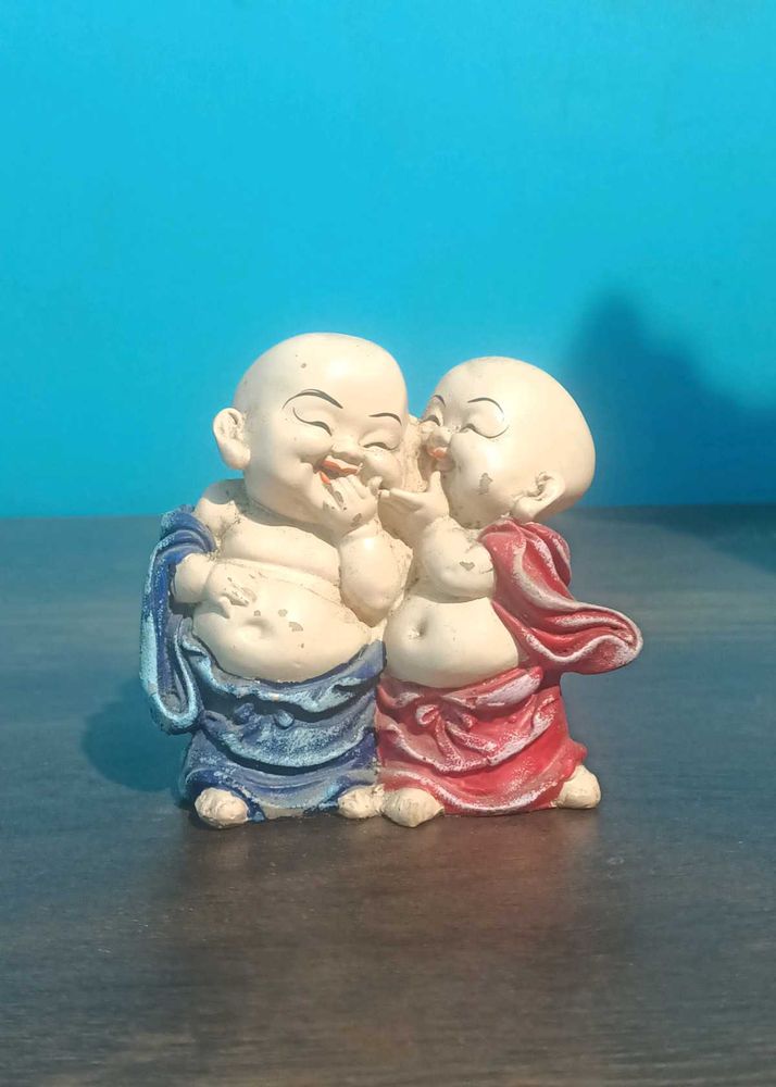 2 laughing buddhas