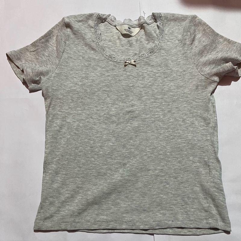 Light grey ripped short sleeve top
