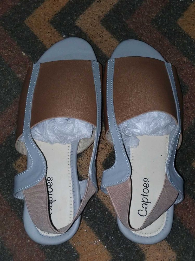 Sandals.