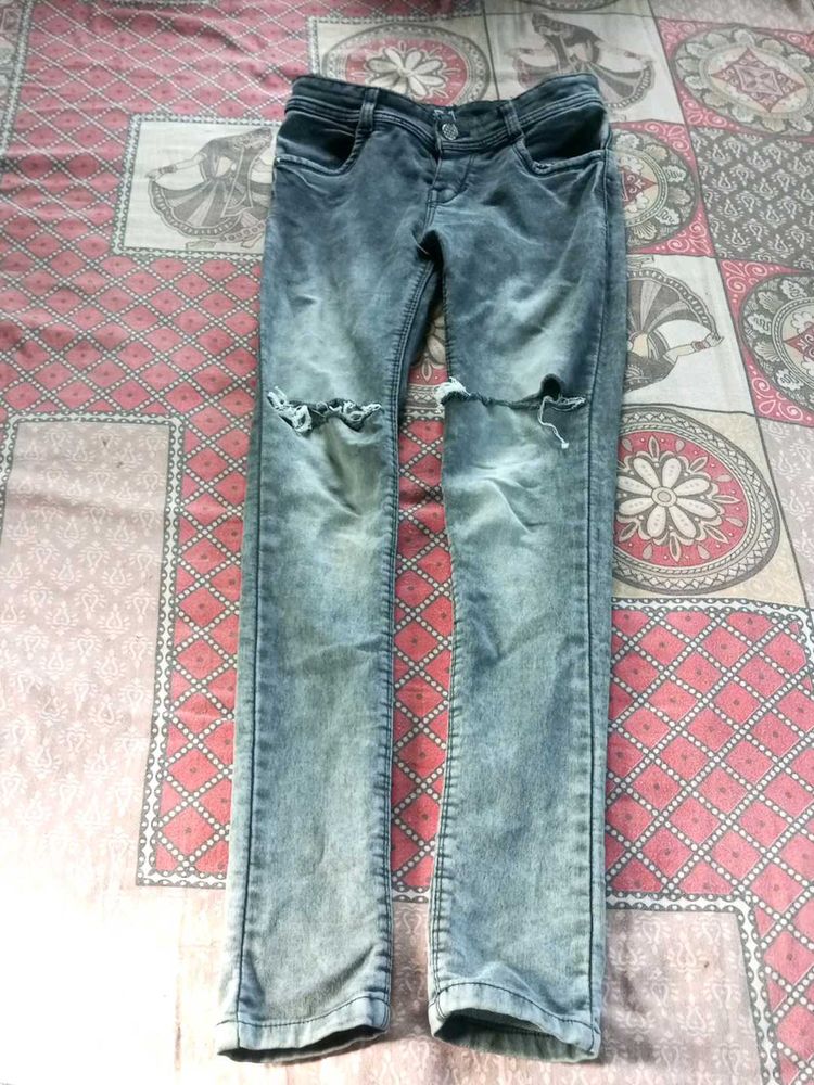 Ripped Knee Jeans