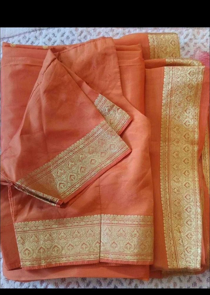 Orange Saree with Gold Border Blouse