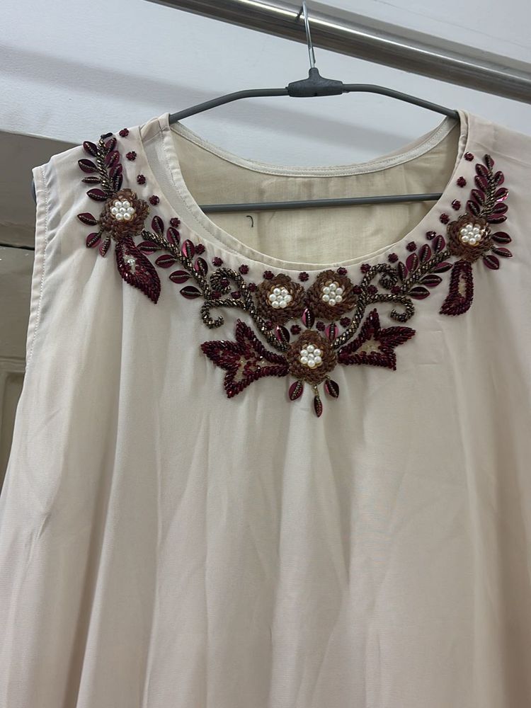 Off White Georgette Gown With Heavy Embroidery