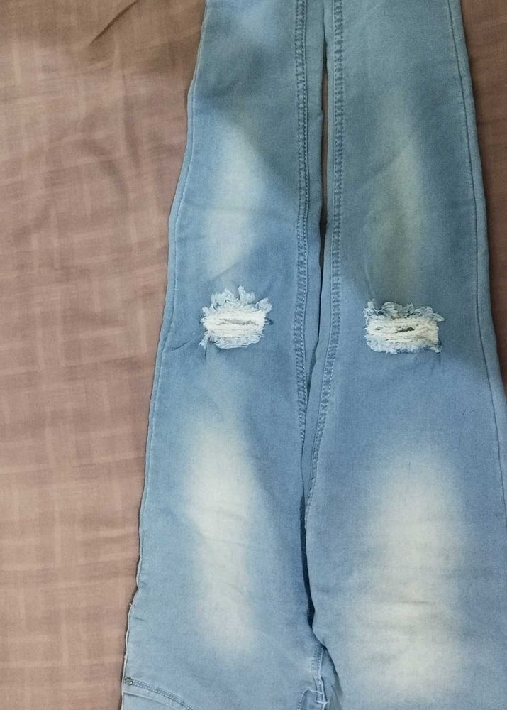 Ripped Light Wash Denim Jeans