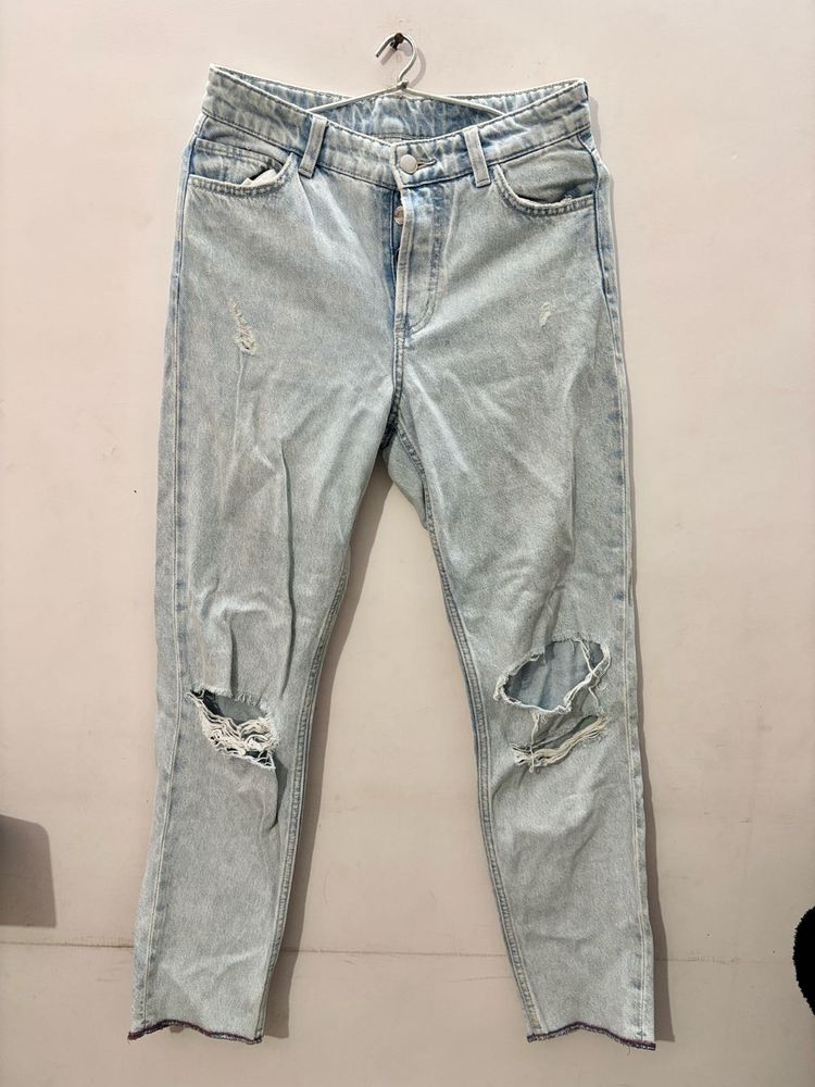 Distressed Light Wash Denim Jeans