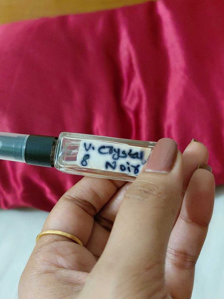 Crystal Noir- Versace-8ml used about 1ml.
