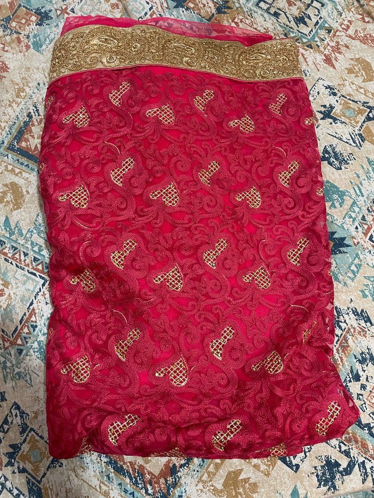 Hot Pink Embellished Net Saree