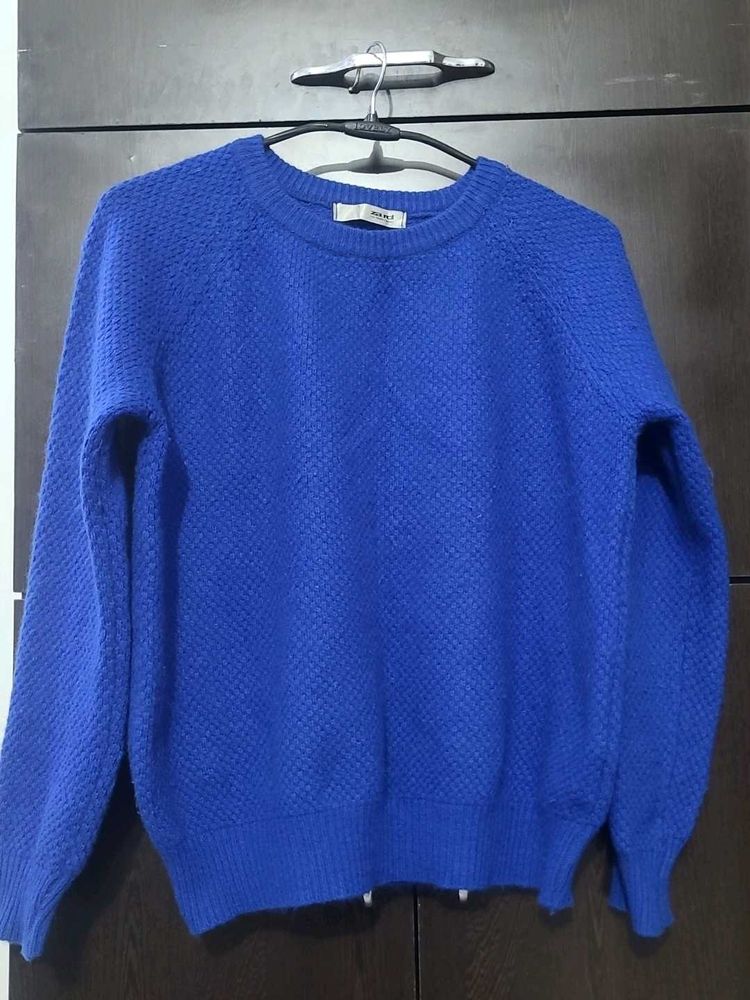 Branded Almost new -Blue Self design Sweater.