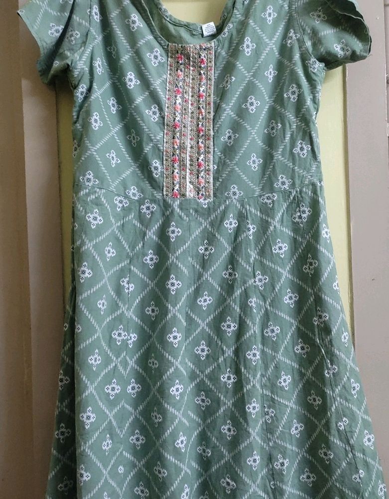 A Green Frock Type Top With Size XXL
