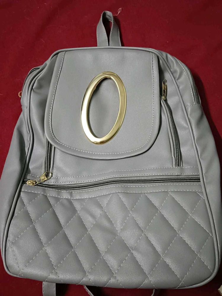 Gray Quilted Backpack