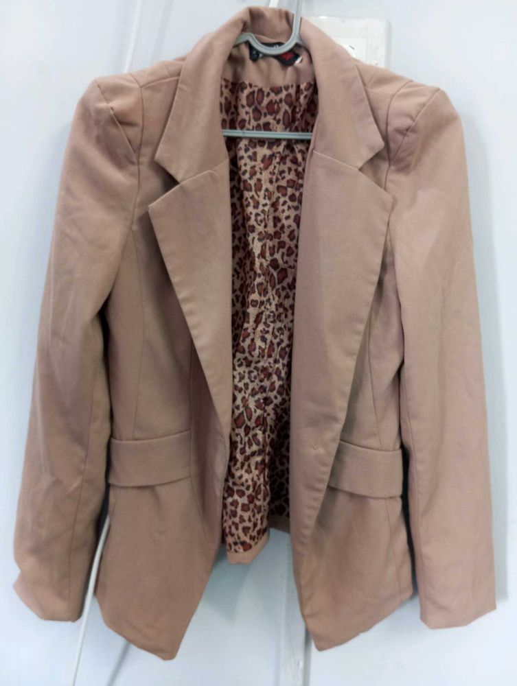 Nude blazer. In Very Good Condition