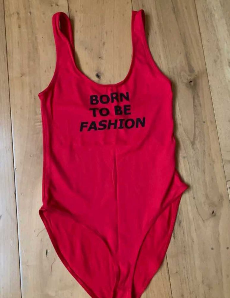 Zara ladies red body suit ‘Born to Fashion Slogan