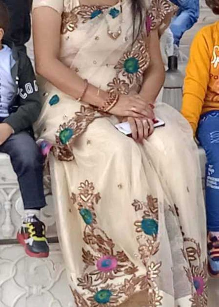 Elegant Cream Colour Embroidery Saree