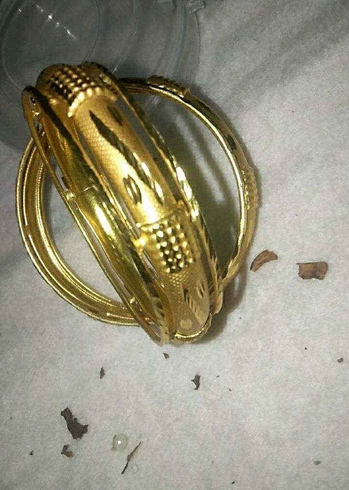 Elegant Gold Tone Bangles