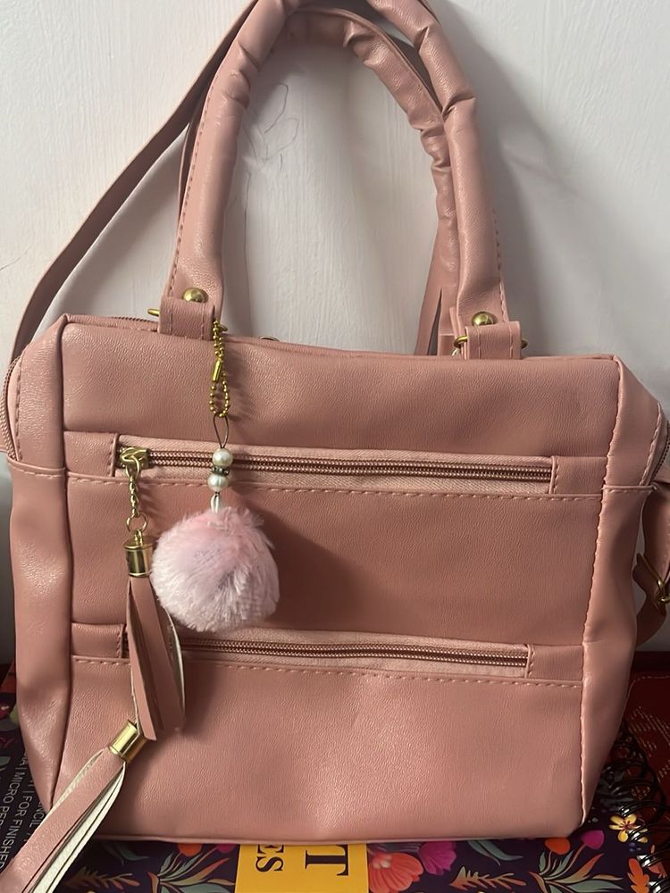 Chic Handbag with Pom-Pom Charm