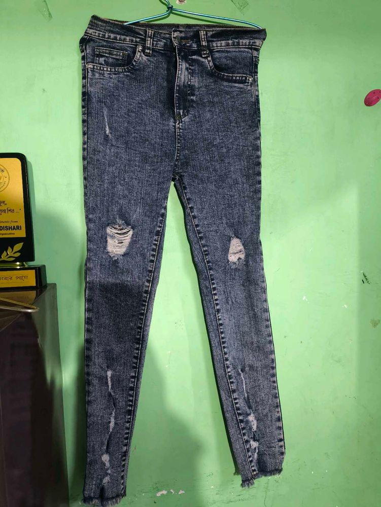 Distressed Denim Jeans