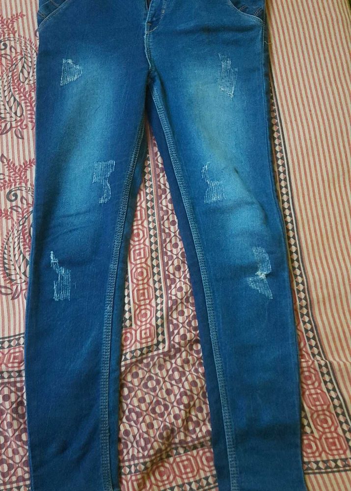 Distressed Denim Jeans