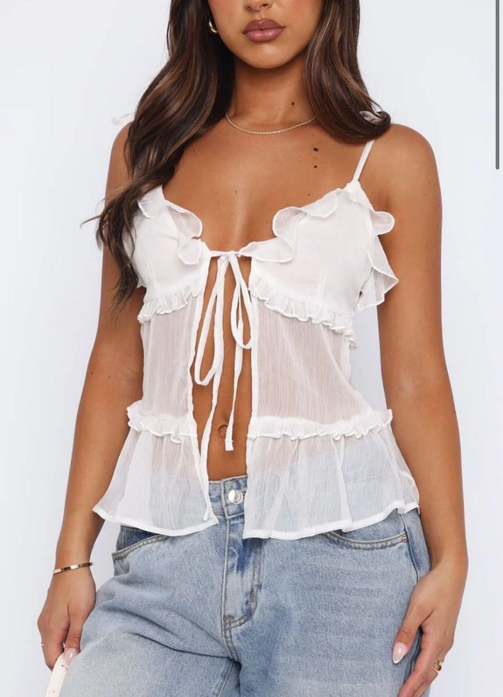 outcasts tie up white top