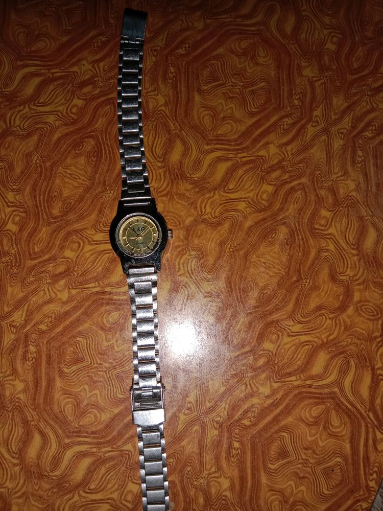 Silver Watch For Men And Women Both