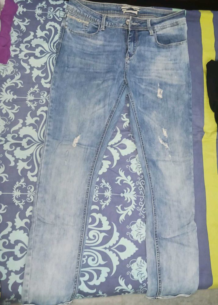 Distressed Denim Jeans