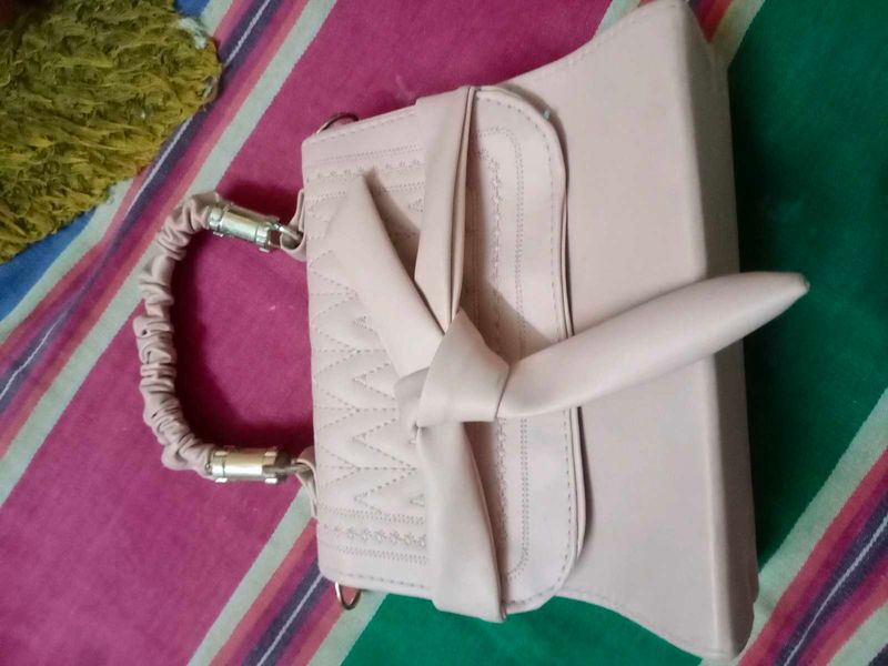 Elegant Pink Handbag with Bow Detail