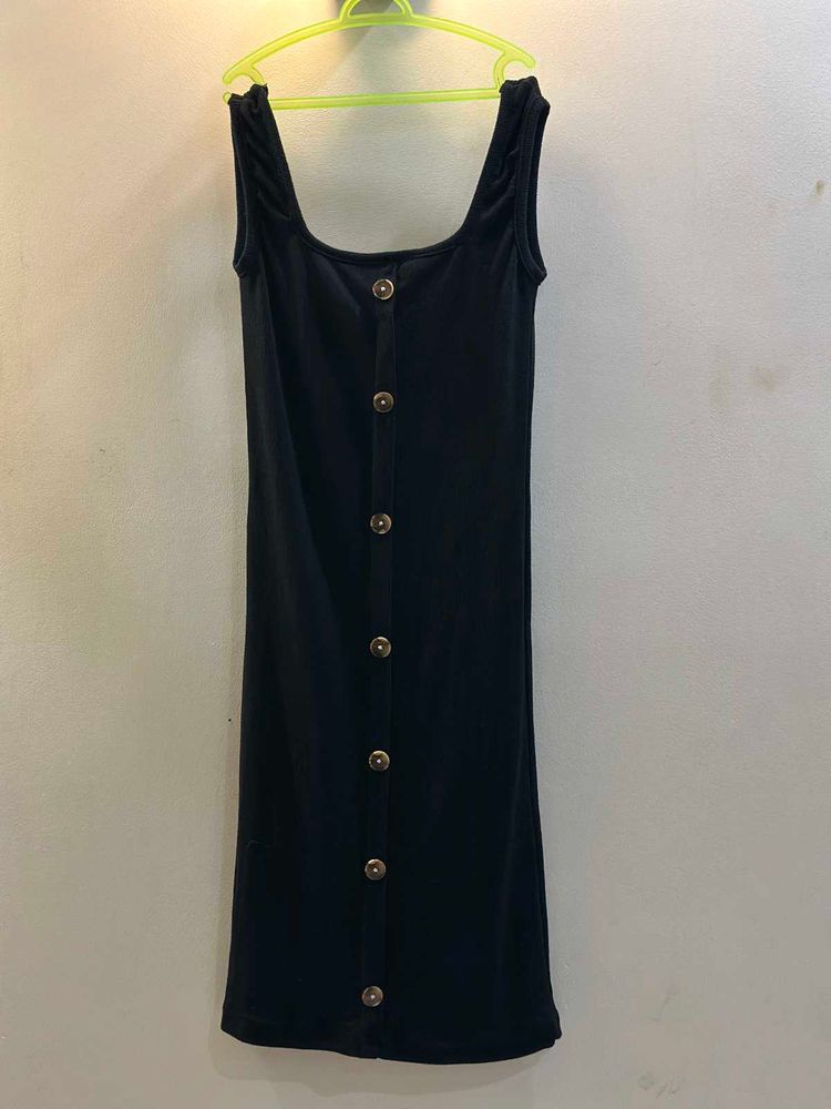 Black Sleeveless Bodycon With Buttons On It
