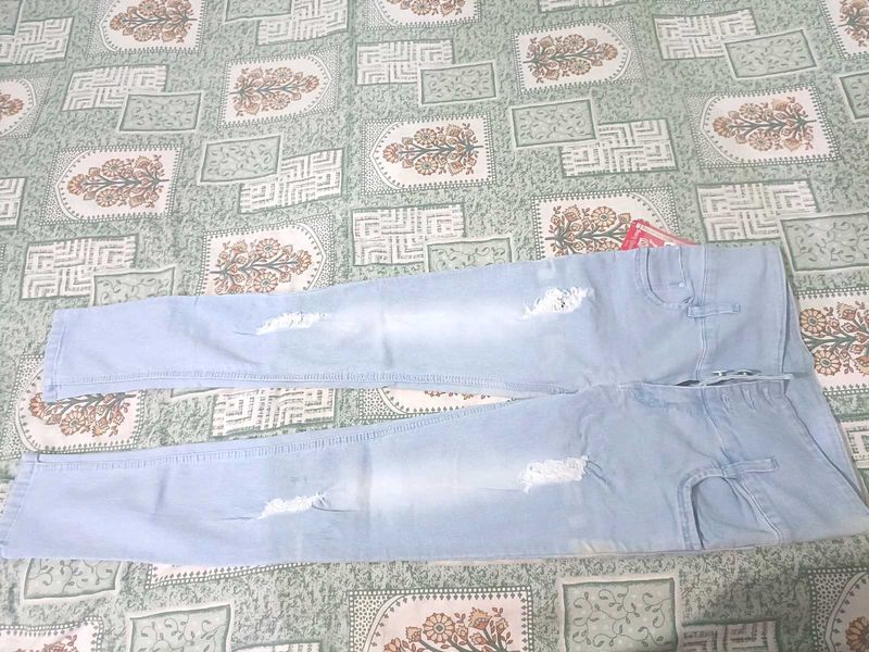 Ripped Light Blue Jeans