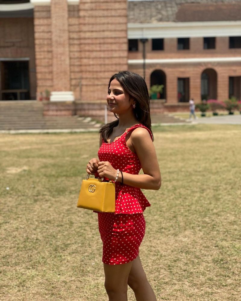 red dress with Polka Dot Handbag both