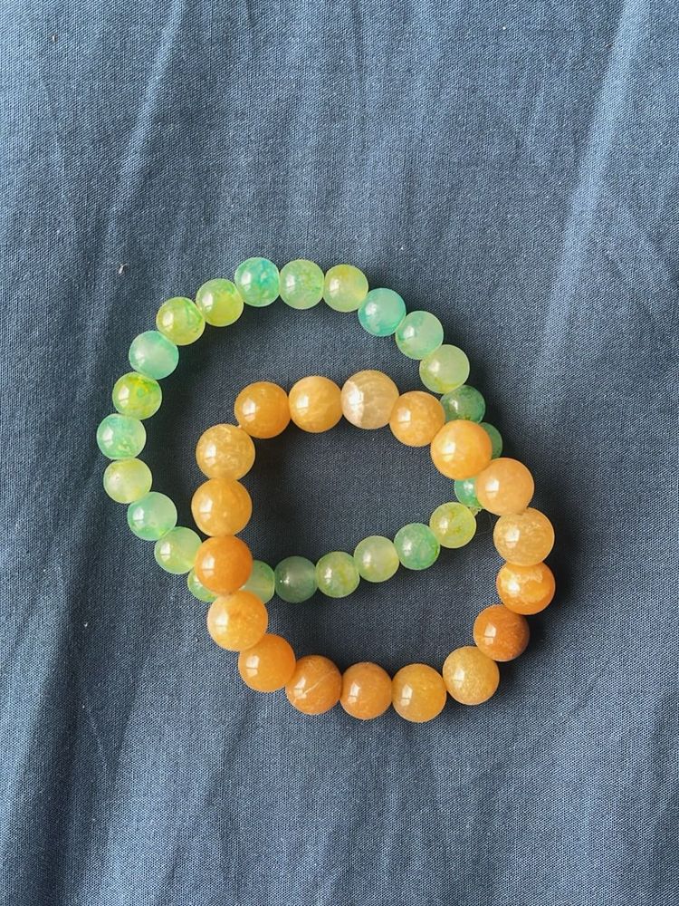 Beaded Bracelets In The Colours Green And Ochre