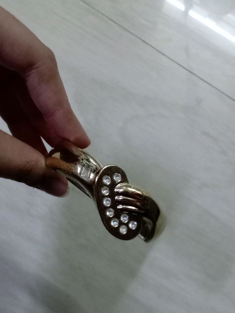 Gold Coloured Bracelet.