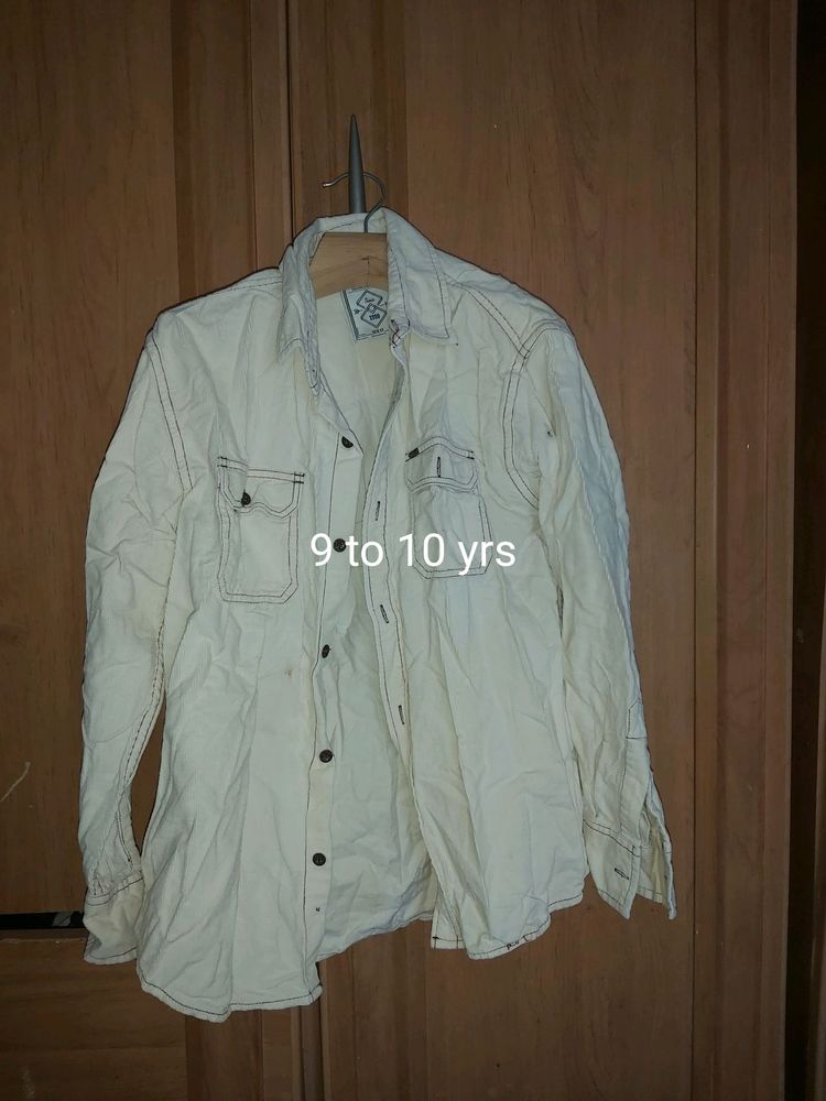 boys 10 year old shirt. used only some times. there is black spot on left front sleeve pls refer the 2nd pic.