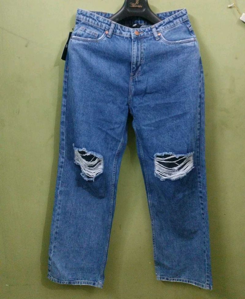 Ripped Knee Denim Jeans