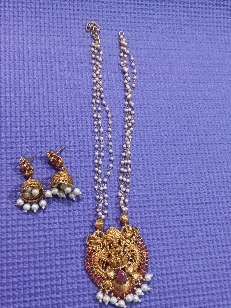Moti Haar With Laxmi Pendant And Jhumkas