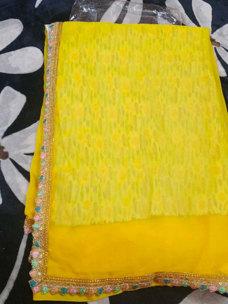 Yellow Georgette Saree With printed blouse(new)