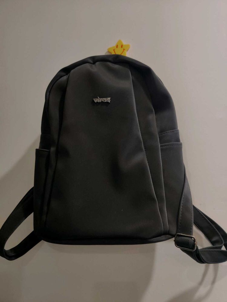 Black Backpack with Charm Detail