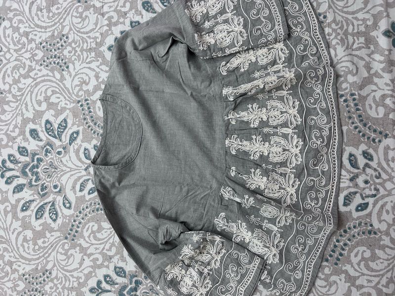 Grey Colored Embroidered Peplum Top