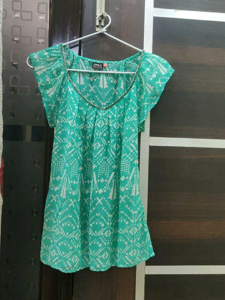 Green embellished top