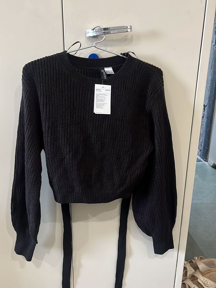 crop-top style cardigan with tag