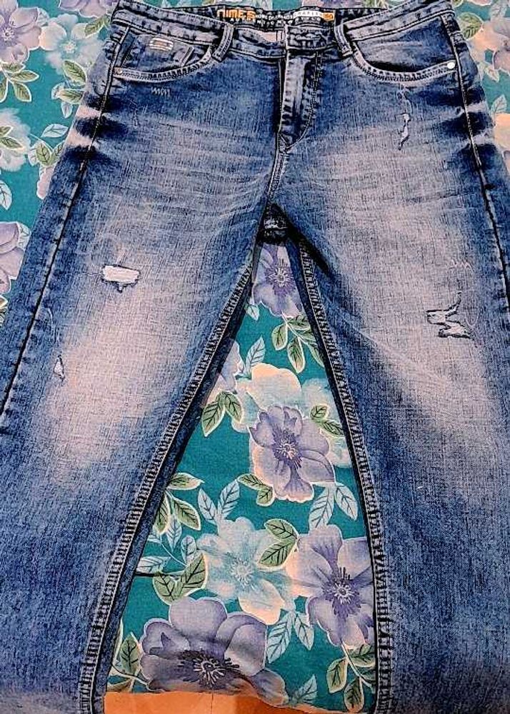 Distressed Denim Jeans