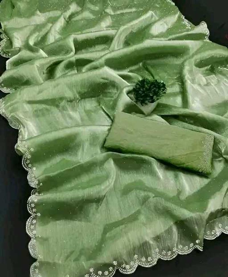 Elegant Green Saree with Delicate Lace