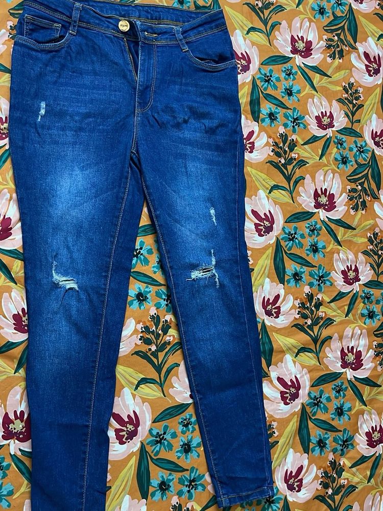 Distressed Denim Jeans