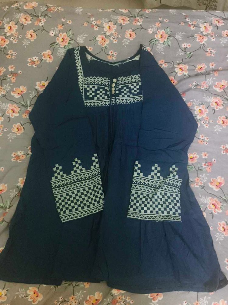 Blue Top With White Embroidery